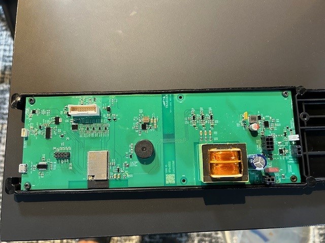 Image showing placement of new motherboard being installed. 