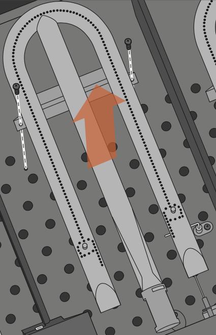 Image of screws on both sides of the U-burner that need to be removed. 