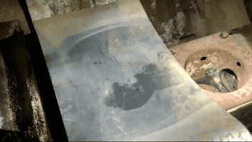 Auger spinning backward/counterclockwise