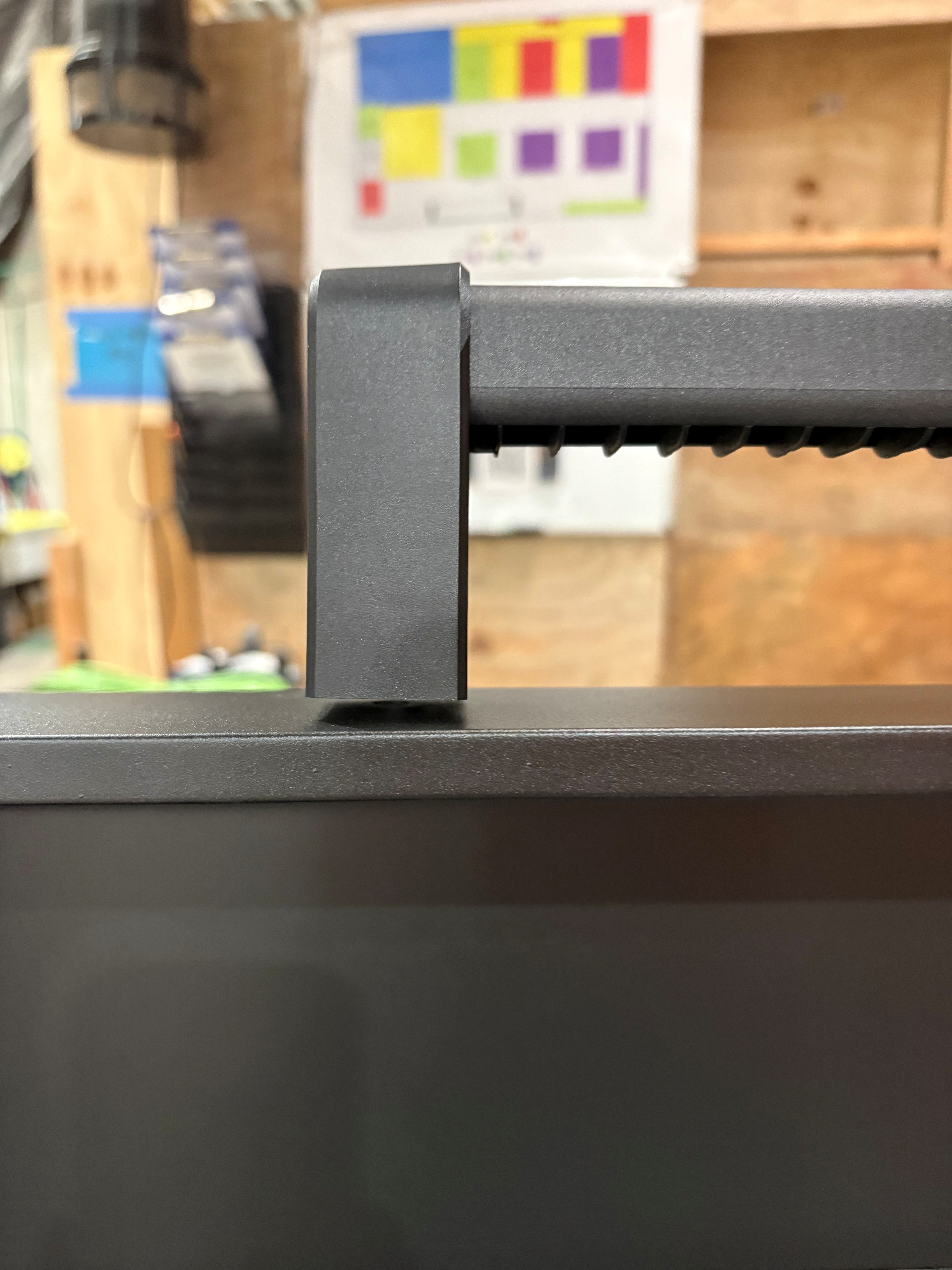 Image of the new lid handle being placed.