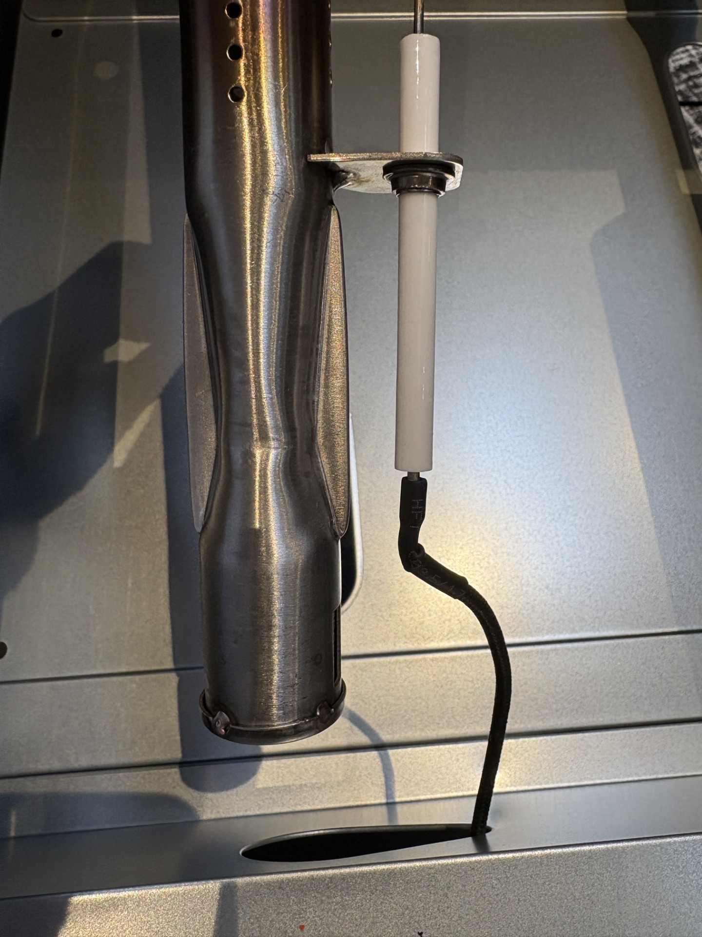 Image showing location of the ignitor on the stick burner.