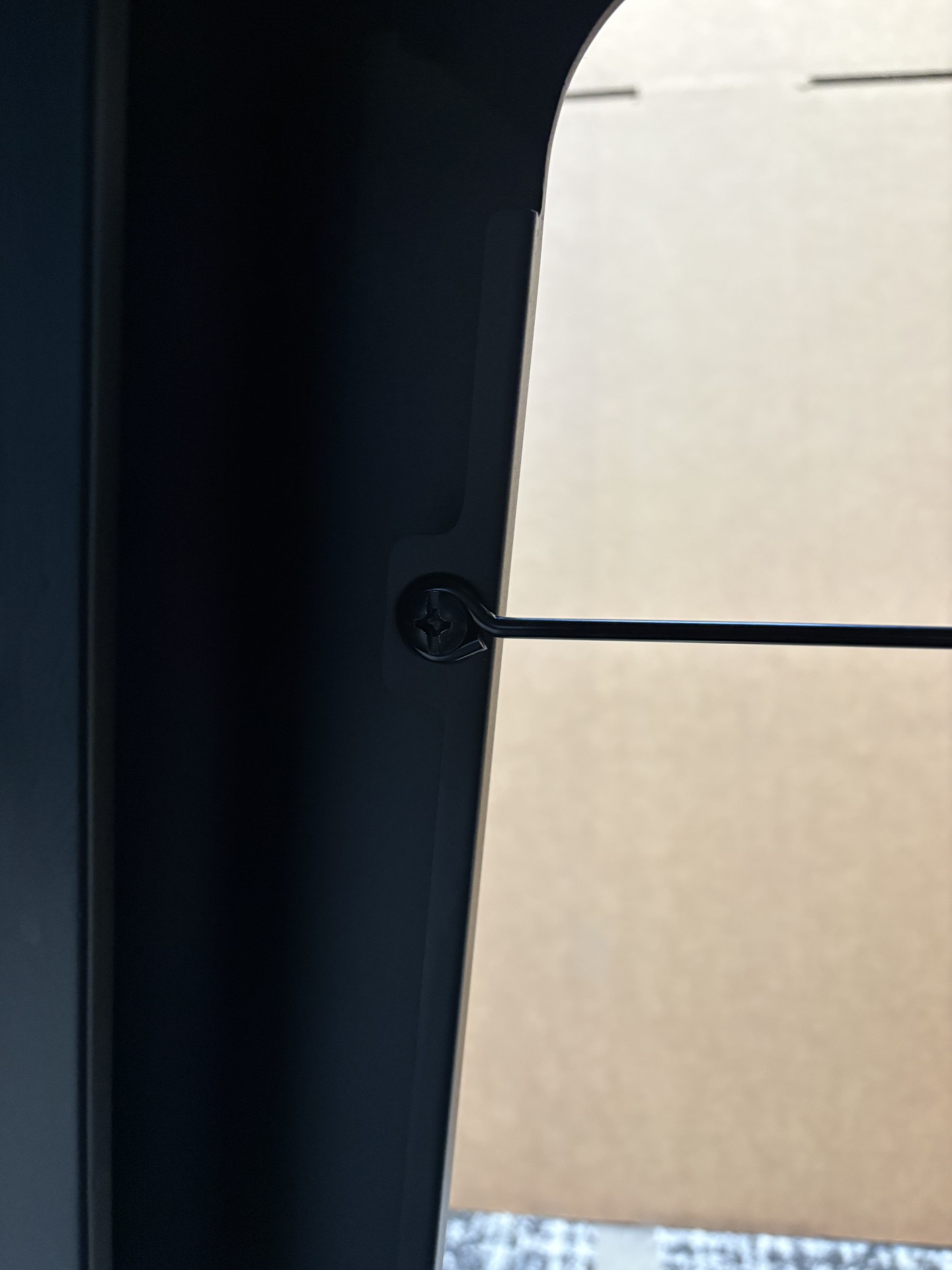 Image showing location of screw to remove.