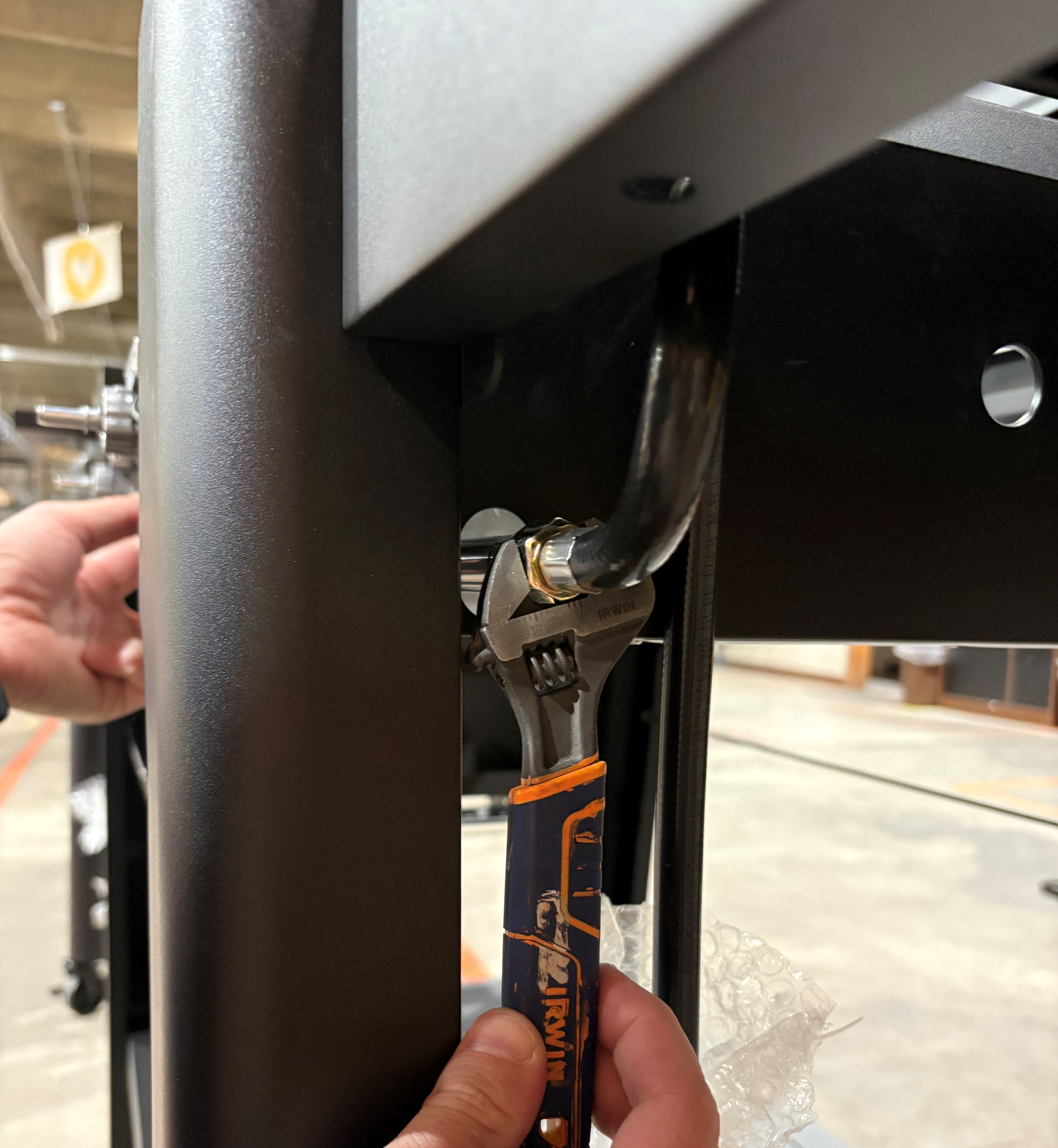 Image of regulator hose being removed.