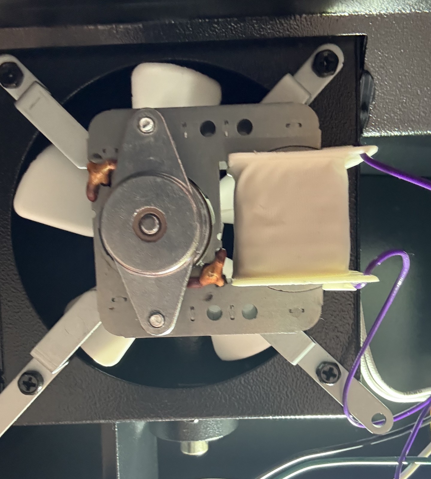 Manually spinning the induction fan