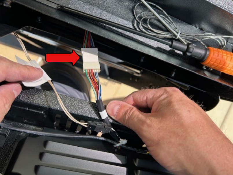 Image of the wiring harness connection that needs to be disconnected.